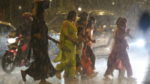 Flooded roads and rescue workers in Uttarakhand during monsoon